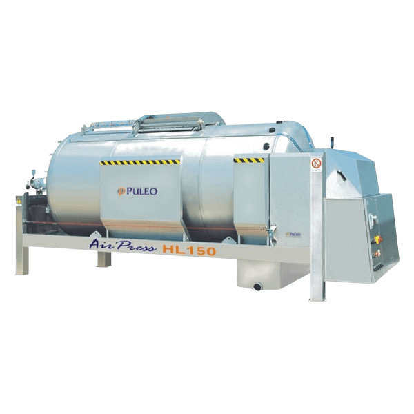 Image of a large, industrial stainless steel machine used for winemaking, branded "Puleo." The machine is labeled "SC-150 Closed Tank Membrane Press" and has a cylindrical shape with various attachments, control panels, and a safety warning sign on the side.